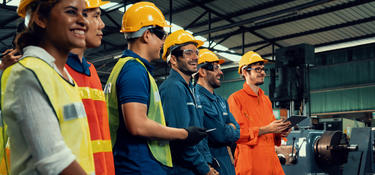 A group of workers inside of a building