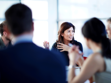 People sitting at a table having a discussion